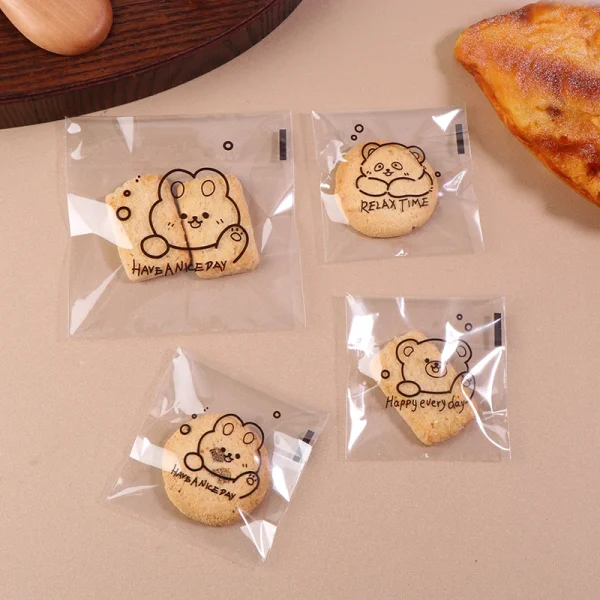 100Pcs Cute Cartoon Bear Pattern Transparent Bread Gift Wrap Self-sealing Bag Happy Everyday Blessing Printed Square OPP Bags